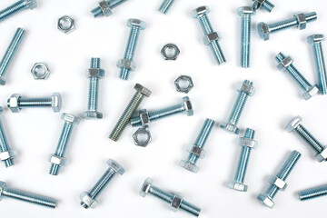 metal nuts and bolts on a white background
