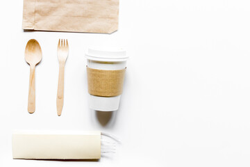 breakfast take away with paper bags on white table background top view mock up