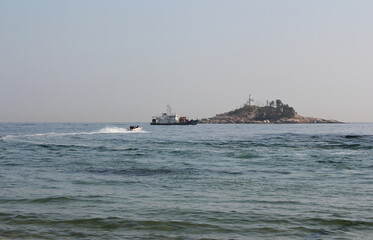 Motor boats and Police ship at sea in summer 