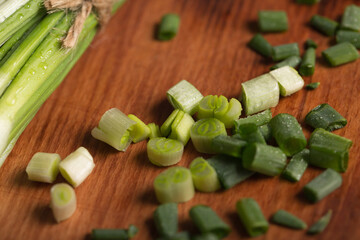 Chives chopped on a kitchen board