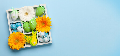 Easter greeting card with flowers and easter eggs