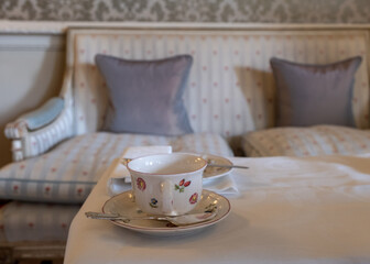 Table set for an English afternoon tea in a stately home.