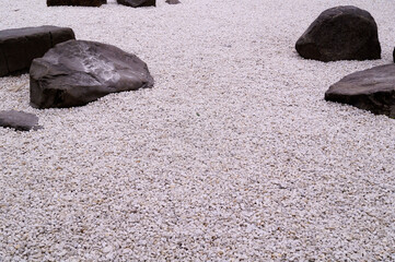 White small stones and big black stones.