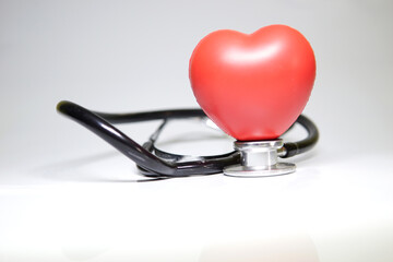 Red Heart And A Stethoscope On White Background