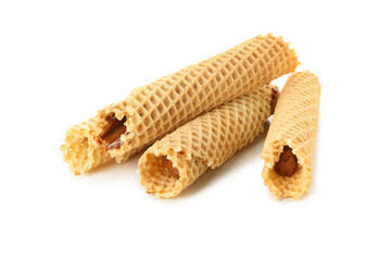 Wafer rolls with condensed milk isolated on white background