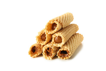 Wafer rolls with condensed milk isolated on white background