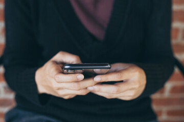 woman work using cell phone hand holding mobile texting message contact us.chatting,search internet information in office.technology device communication connecting