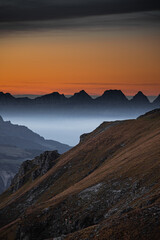 Naklejka na ściany i meble Sonnenuntergang auf dem Pizol Gebirge, Schweiz