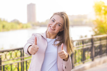 Portrait of a young happy and pretty blonde girl