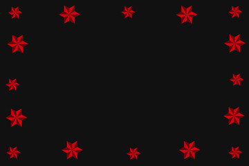 Red geometric shapes like a star like a frame on a black background