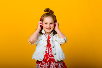 Happy child emotions. Energetic, angry, surprised joyful adorable little girl on studio background.