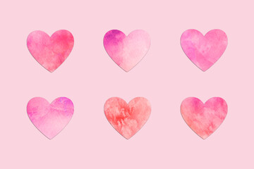 Paper hearts aligned on pink background, minimal valentines day card