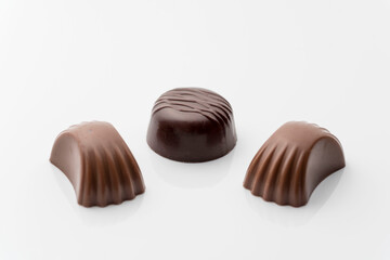 Closeup shot of tasty chocolate candies on white background