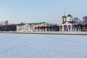 Kuskovo palace and park in winter. Count Sheremetev's Manor house, Сhurch of the Savior and bell...