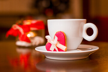 Valentine's Day with tea and sweet cake heart and lantern