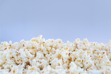 Popcorn texture on a blue background.