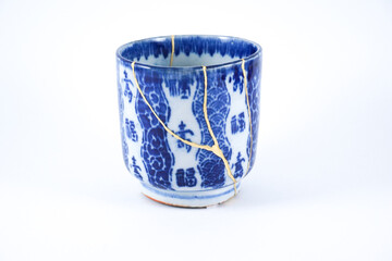 Antique blue and white kintsugi tea cup