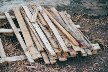 Fototapeta na wymiar Reclaimed pallet wood boards on ground. Pallet Wall timber.