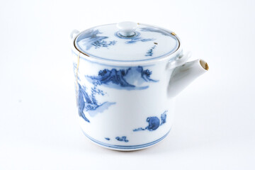 blue and white Kintsugi teapot , kintsugi the beauty of imperfection. Japanese artisan traditional Kintsukuroi method. Real gold restoration.