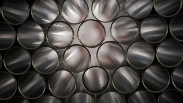 Abstract background of steel pipes stacked on a pallet