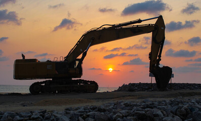 Background image of construction site during sunset