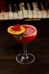 Strawberry alcohol cocktail in a beautiful glass
