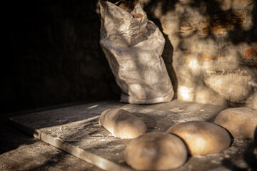 handcrafted sourdough bread making sun rays of light © simone