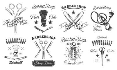 Set of logotype for barbershop in black and white style. Emblems with tools and letterings. Barber shop logo flat vector design. Hairdressing salon signboard with equipment icons vintage retro symbol