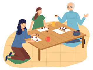 Happy family spend time at home. People playing bingo lotto game at table. Mother, daughter and grandfather together at home playing table game. Indoors home activity, hobby. Parents and kids