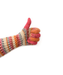 hand in knitted mitten isolated on white background