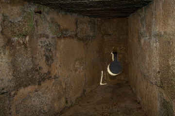 Loophole in the medieval walls of Granadilla castle. Extremadura. Spain.