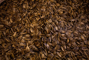background image of multiple sunflower seeds on the shop for sale