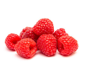 Red raspberry berries on a poor background
