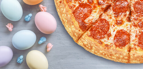 decorative easter eggs on a light wooden background. Easter-themed background with place for text