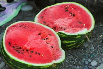 Juicy red watermelon in halves closeup