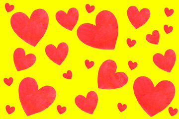 Several wooden hearts against yellow background, love concept