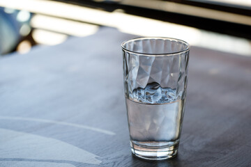 Cocktail in a glass on a bright table.