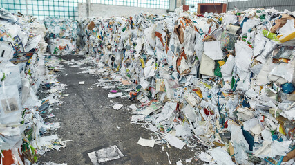 Stacks of waste paper lying in rows