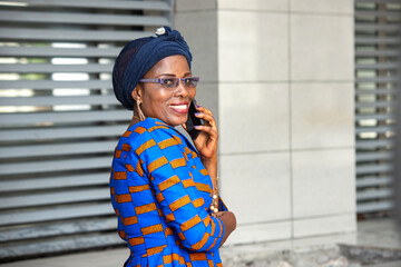 Fototapeta premium beautiful adult businesswoman talking on mobile phone.