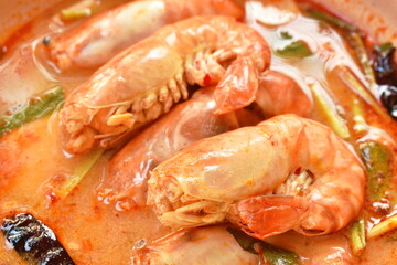 boiled river shrimp with herb in Thai spicy soup or tom yum kung on bowl