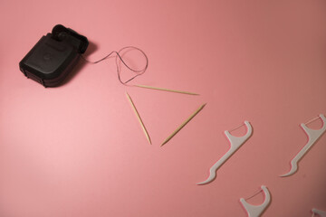 oral hygiene and dental floss with toothpicks