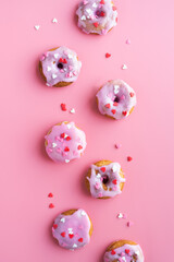 Small donuts isolated on pink background