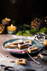 Czech traditional christmas sweets Linzer cookies with homemade red currant jam
