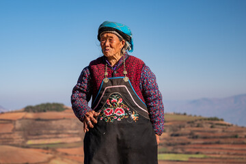old woman outdoor portrait in Yunnan, China
