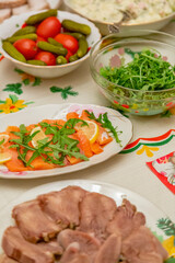 Delicious food and snacks on a festive served table on New Year's and Christmas Eve