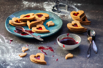 Czech traditional christmas sweets Linzer cookies with homemade red currant jam