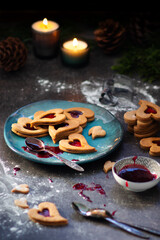 Czech traditional christmas sweets Linzer cookies with homemade red currant jam