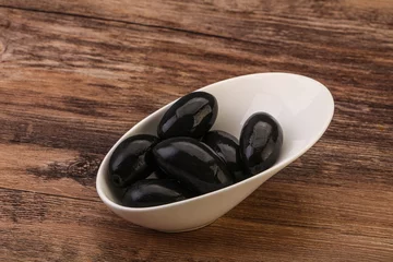 Foto op Plexiglas Pickled black olives in the bowl © Andrei Starostin