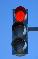 Traffic lights over urban intersection. Red light