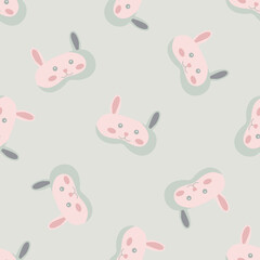 Rabbit light pink color geometric seamless pattern on light green background. Children graphic design element for different purposes.